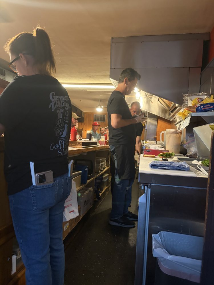 Inside German Village Coffee Shop — the counter, the griddle, the regulars